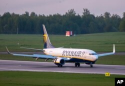 FILE - In this May 23, 2021, photo, a Ryanair jet that carried opposition figure Raman Pratasevich was diverted to Minsk, Belarus, after a bomb threat.