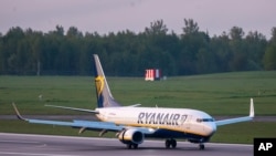 FILE - In this May 23, 2021, photo, a Ryanair jet that carried opposition figure Raman Pratasevich was diverted to Minsk, Belarus, after a bomb threat.