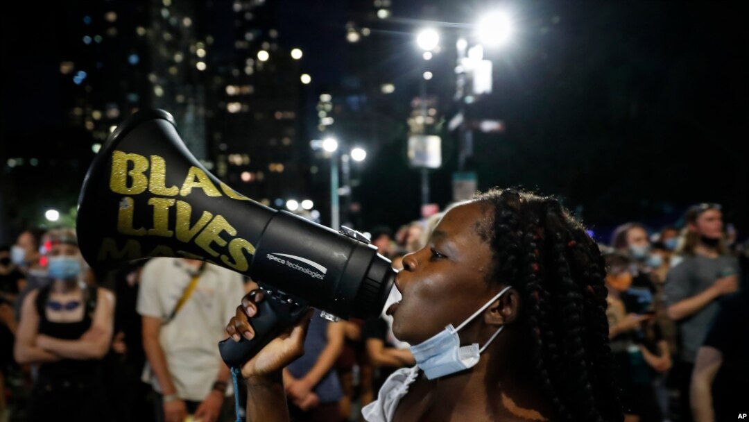FILE - Protesters gather at an encampment outside City Hall in New York, June 30, 2020. Black activists from across the U.S. will hold the 2020 Black National Convention on Aug. 28, 2020, via livestream to produce a new political agenda.