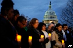 FILE - Christian leaders gather for a prayer vigil to mark the second year anniversary of the violent insurrection by supporters of then-President Donald Trump, on Capitol Hill in Washington, Friday, Jan. 6, 2023.