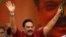 Sri Lanka's former president Mahinda Rajapaksa waves at his supporters as he arrives at a protest rally to launch a plan to topple the current government, accusing it of failing in its "management and development of the country" in Colombo, Sri Lanka, Jan. 27, 2017.