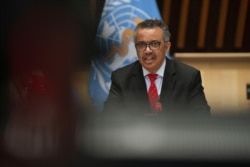 FILE - WHO Director-General Tedros Adhanom Ghebreyesus attends the 147th session of the WHO Executive Board held virtually by videoconference, May 22, 2020, in this image provided by the World Health Organization in Geneva.