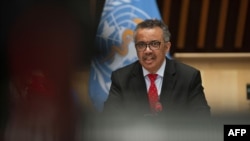 FILE - WHO Director-General Tedros Adhanom Ghebreyesus attends the 147th session of the WHO Executive Board held virtually by videoconference, amid the COVID-19 pandemic, May 22, 2020, in this image provided by the World Health Organization in Geneva. 