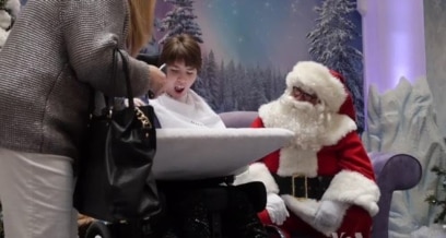 Santa Brings Christmas Joy To Deaf Children