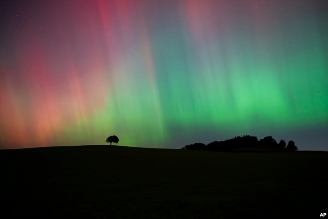 FILE - The Northern Lights, also known as the Aurora Borealis, are seen in the sky near Knaresborough, England, Oct. 11, 2024. (Andrew Hawkes via AP)