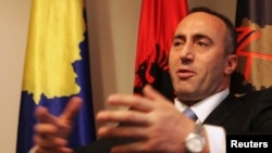 FILE - President of the Alliance for the Future of Kosovo (AAK) Ramush Haradinaj, a Kosovo Albanian former guerilla commander who served briefly as prime minister, speaks during an interview with Reuters at the AAK headquarters in Pristina, Dec. 4, 2012.