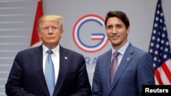 U.S. President Donald Trump and Canada's Prime Minister Justin Trudeau hold a bilateral meeting during the G7 summit in Biarritz, France, August 25, 2019.