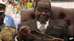 President Robert Mugabe in Zvimba, Zimbabwe, Jan. 21, 2014. 