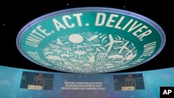 FILE - United Nations Climate Chief Simon Stiell speaks during a session at the COP28 U.N. Climate Summit, December 2, 2023, in Dubai, United Arab Emirates.