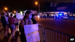 (File) Protesters in Memphis, Tenn. gather outside a police precinct May 27, 2020, to voice their anger of the death of George Floyd in police custody in Minneapolis.