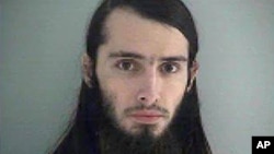 FILE - Court documents say Christopher Lee Cornell, shown in this Butler County (Ohio) Jail photo, intended to set off pipe bombs outside the U.S. Capitol and shoot people around it.