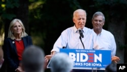 FILE - Former Vice President and Democratic presidential candidate Joe Biden speaks during a house party at former Agriculture Secretary Tom Vilsack's house in Waukee, Iowa, July 15, 2019.