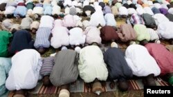 Muslims offered their prayers during a religious holiday.