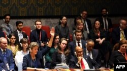 US Deputy Ambassador to the UN Robert Wood (R) and British Ambassdor to the UN Barbara Woodward (L) attend a United Nations Security Council meeting on a resolution calling for a ceasefire in Gaza at UN headquarters in New York on December 8, 2023.