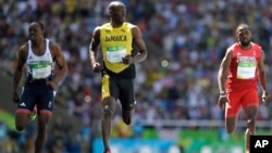 Jamaica's Usain Bolt, center, Trinidad and Tobago's Richard Thompson, right, and Britain's James Dasaolu compete in a men's 100-meter heat during the athletics competitions of the 2016 Summer Olympics at the Olympic stadium in Rio de Janeiro, Brazil, Aug. 13, 2016