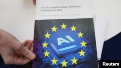 FILE - A copy of "The European Union Artificial Intelligence (AI) Act" on display during the AI & Big Data Expo 2025 at the Olympia, in London, Britain, February 5, 2025. REUTERS/Isabel Infantes