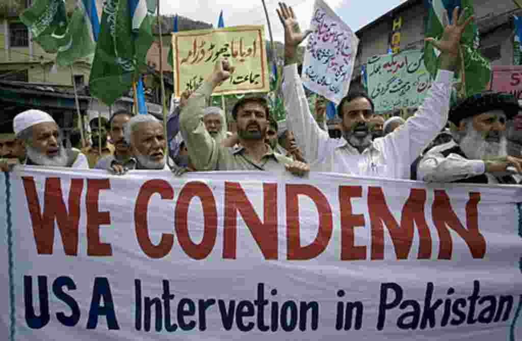 Supporters of a Pakistani religious group Jamaat-e-Islami chant slogans during an anti American rally in Abbottabad, Pakistan, on Friday, May 6, 2011. Osama bin Laden was killed by a helicopter-borne U.S. military force on Monday, in a fortress-like comp