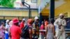 FILE - People lineup to vote in the second round of presidential elections in Monrovia, Liberia, Tuesday, Nov. 14, 2023. 