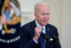 President Joe Biden speaks about the COVID-19 vaccination program, in the State Dining Room of the White House, May 4, 2021.