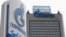 FILE - A general view shows the headquarters of Gazprom, with a board of Gazprom Neft, the oil arm of Gazprom seen in the foreground, on the day of the annual general meeting of the company's shareholders in Moscow. 