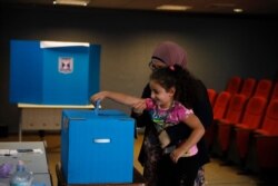 Israeli Arabs vote in Kfar Manda, an Arab town in Israel, Sept. 17, 2019.