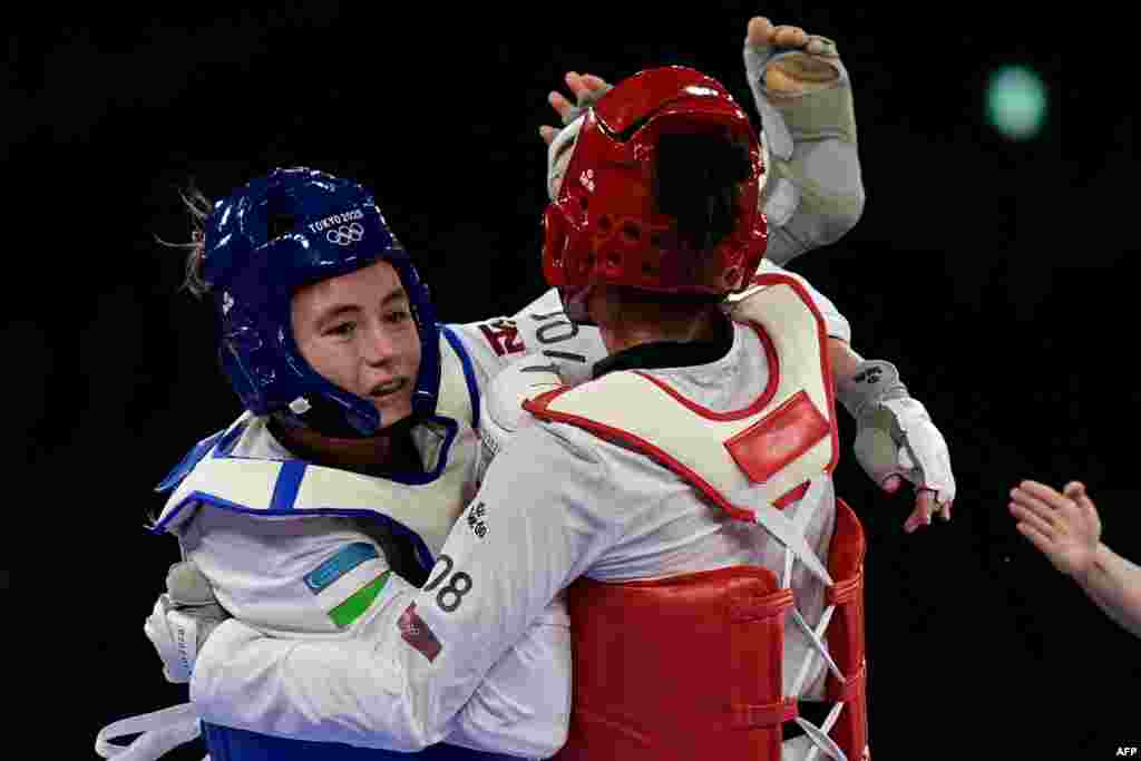 O'zbekistonlik taekvandochi Svetlana Osipova kurash mahoratini namoyish etmoqda. Tokio.