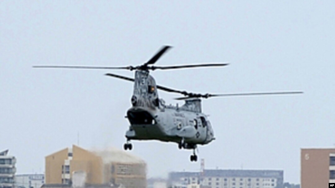 US Marines' CH-46E helicopter takes off from the US Marine Corps Air Station Futenma in Ginowan, Okinawa prefecture. (File 2010)