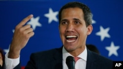 Venezuela's opposition leader and self-proclaimed interim President Juan Guaido speaks to journalists during a press conference in Caracas, Venezuela, June 17, 2019.