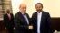 Sudan's prime minister Abdalla Hamdok shakes hands with French Foreign Minister Jean-Yves Le Drian during their meeting in Khartoum, Sudan, Sept. 16, 2019. 
