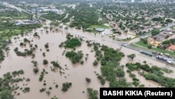 A drone view shows the flooded area at Molapo Crossing Mall and the Western Bypass highway in Gaborone, Botswana, Feb. 19, 2025 in this screengrab from a video obtained from social media. 