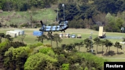 A Terminal High Altitude Area Defense (THAAD) interceptor (right) is seen in Seongju, South Korea, April 26, 2017. 