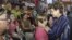 Brazil's President Dilma Rousseff (R) consoles relatives of victims of a fire which occurred at the Boate Kiss nightclub in the southern city of Santa Maria, January 27, 2013.