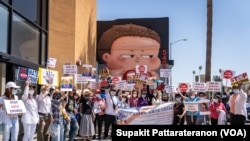 A crowd of dozens of Thai Americans gathers to raise awareness about the increase in hate crimes against Asians in the US during a rally to speak up and show solidarity for the AAPI community at the Thai Town, Los Angeles, CA. April 8, 2021.