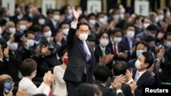 Foreign Minister Fumio Kishida gestures as he is elected as new head of the ruling party LDP, in Tokyo, Japan September 29, 2021. 
