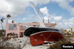 A stranded sailboat is seen after Hurricane Dorian hit the Abaco Islands in Treasure Cay, Bahamas, Sept. 7, 2019.