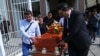 Relative and friends of slain journalist Mauricio Solis carry his coffin during his wake in Uruapan, Mexico, Oct. 30, 2024.