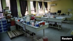 FILE - Equipment is seen on tables inside the laboratory of the National Biomedical Research Institute (INRB) in Kinshasa, Democratic Republic of Congo, May 18, 2018.