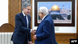 US Secretary of State Antony Blinken (L) meets with Palestinian president Mahmud Abbas, during his week-long trip aimed at calming tensions across the Middle East, in the Muqata'a, in Ramallah in the Israeli-occupied West Bank on January 10, 2024.