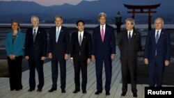 From left, E.U. High Representative for Foreign Affairs Federica Mogherini, and foreign ministers from Canada, Stephane Dion; Britain, Philip Hammond; Japan, Fumio Kishida, U.S. Secretary of State John Kerry; Italy, Paolo Gentiloni, and France, Jean-Marc Ayrault at the Itsukushima Shrine, Miyajima Island, Japan, April 10, 2016. 