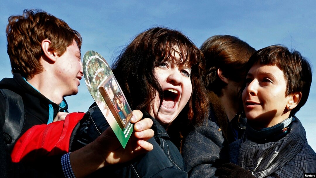Gay rights activist shouts during protest, St. Petersburg, Oct. 12, 2013.