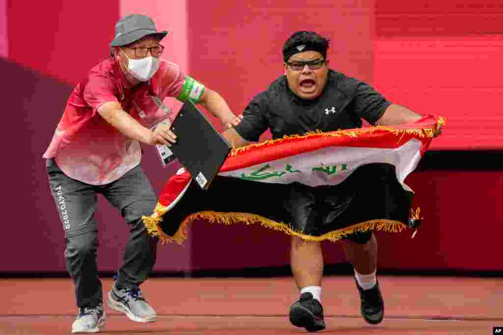 Iraq's Garrah Tnaiash reacts after a throw in the men's F40 shot put final during the 2020 Paralympics at the National Stadium in Tokyo, Japan.