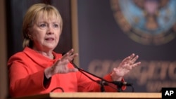 Former Secretary of State Hillary Clinton speaks at Georgetown University in Washington, March 31, 2017, on the important role that women can play in international politics and peace building efforts.