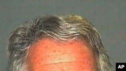 FILE - A July 2006 photo provided by the Palm Beach (Fla.) Sheriff's Office shows Jeffrey Epstein.