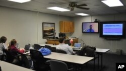 Medical students in the small town of Salina, Kansas - population 50,000 - listen to a remote lecture. 