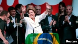 Brazil's President Dilma Rousseff reacts during news conference to the election results, in Brasilia Oct. 26, 2014. (REUTERS/Ueslei Marcelino)