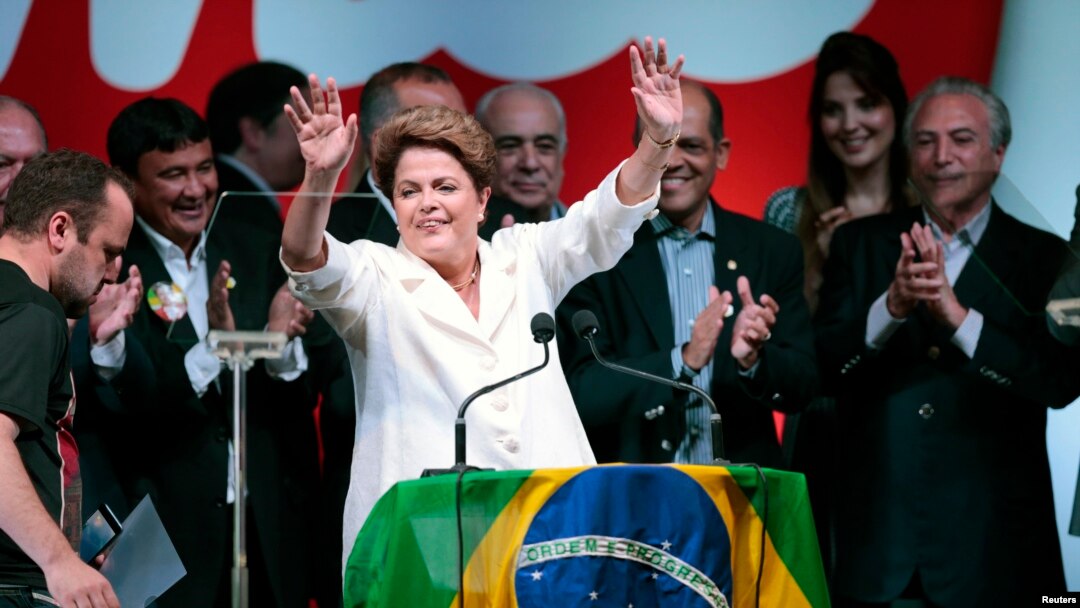 Brazil's President and Workers' Party (PT) presidential candidate Dilma Rousseff reacts during a news conference to the election results, in Brasilia Oct. 26, 2014.