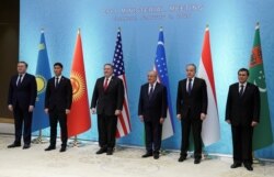 FILE - U.S. Secretary of State Mike Pompeo poses with officials from Central Asia during a meeting of the C5+1 in Tashkent, Uzbekistan, Feb. 3, 2020.