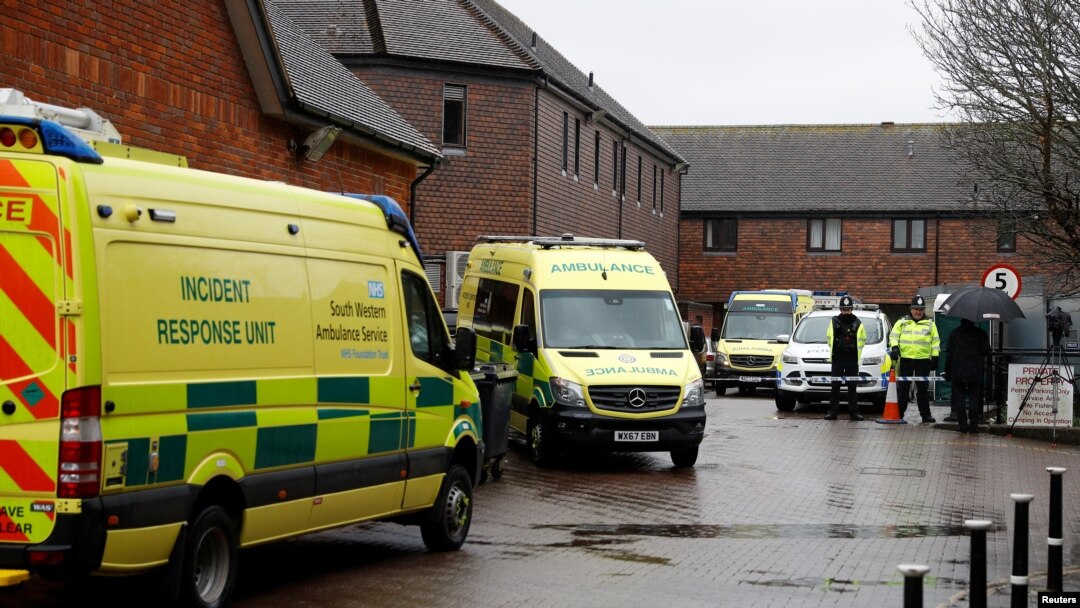 Emergency vehicles behind pub visited by former Russian intelligence officer Sergei Skripal and his daughter Yulia before they found poisoned, Salisbury, Britain, March 28, 2018.