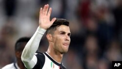 FILE - In this Oct. 19, 2019, photo, Juventus' Cristiano Ronaldo waves at the end of a Serie A soccer match between Juventus and Bologna, at the Allianz stadium in Turin, Italy.