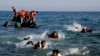 Analysts: Variety of Factors Underlie Migrant Crisis